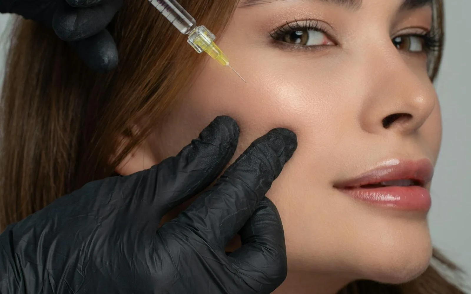 Close-up of a professional facial treatment at Aesthetics Universe Med Spa in Anaheim, CA